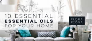 A comfortable relaxing couch in a home with grey and turquoise tones. Superimposed text reads "10 Essential Essential Oils for your home"